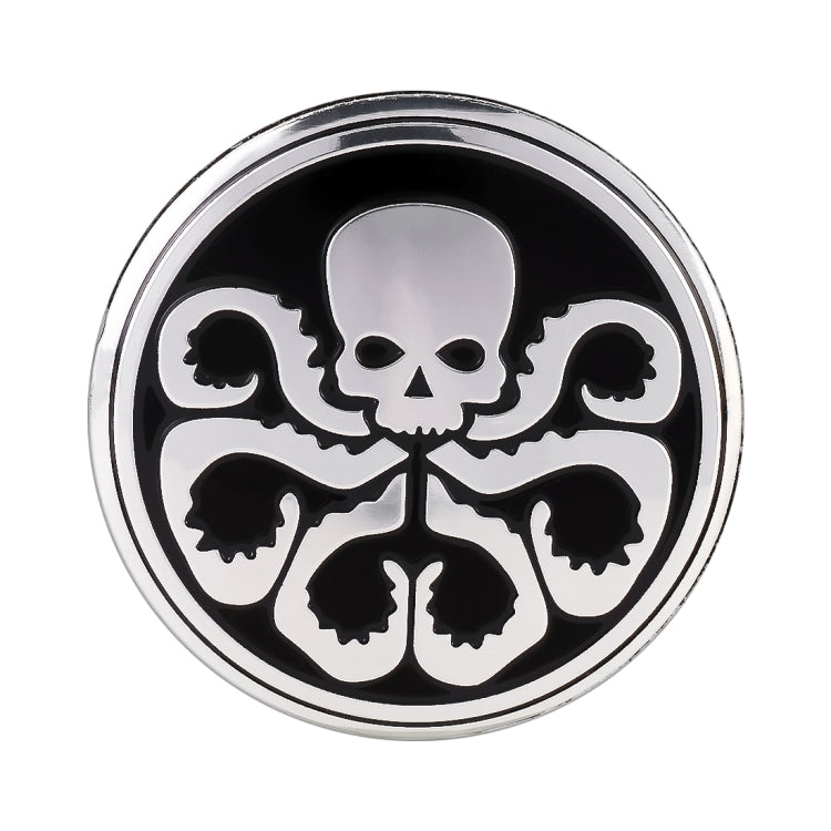 Round wheel hub sticker with black background and white skull graphic