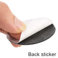 Adhesive backing wheel hub sticker being peeled by hand