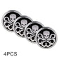 Four round wheel hub stickers with skull-and-crossbones style design