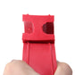 Red D-type shock absorber spring bumper buffer with cutouts, held in hand