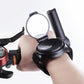 Wrist strap rear view bike mirror attached to a rider’s arm