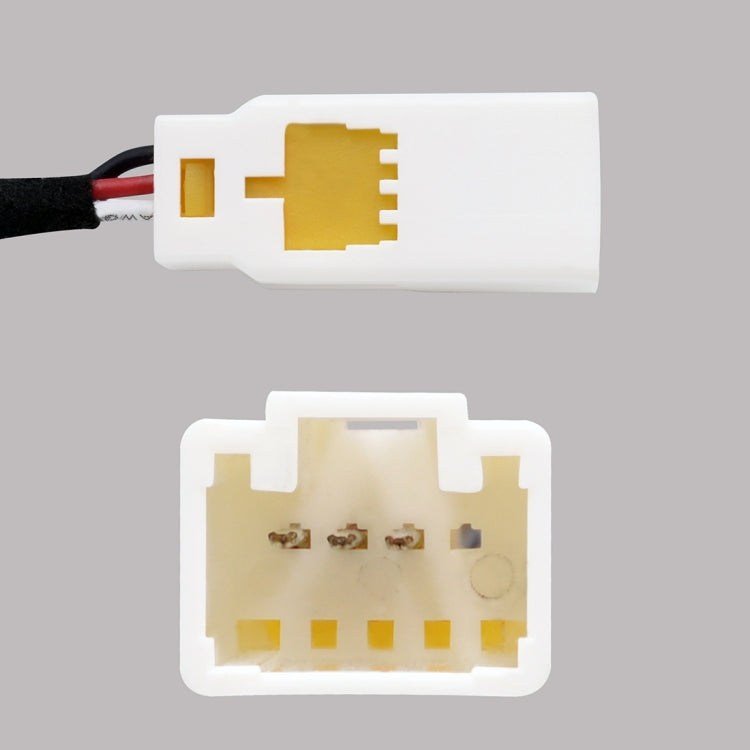 Trunk release switch connector terminals on white housing with gold contacts