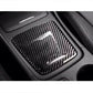 Installed carbon fiber storage box panel decal on dark interior trim with handle cutout