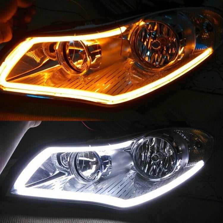 Dual-color LED light strips on car headlamps, warm amber and cool white
