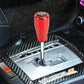 Car gear shift knob with red cone handle and H pattern gear dial