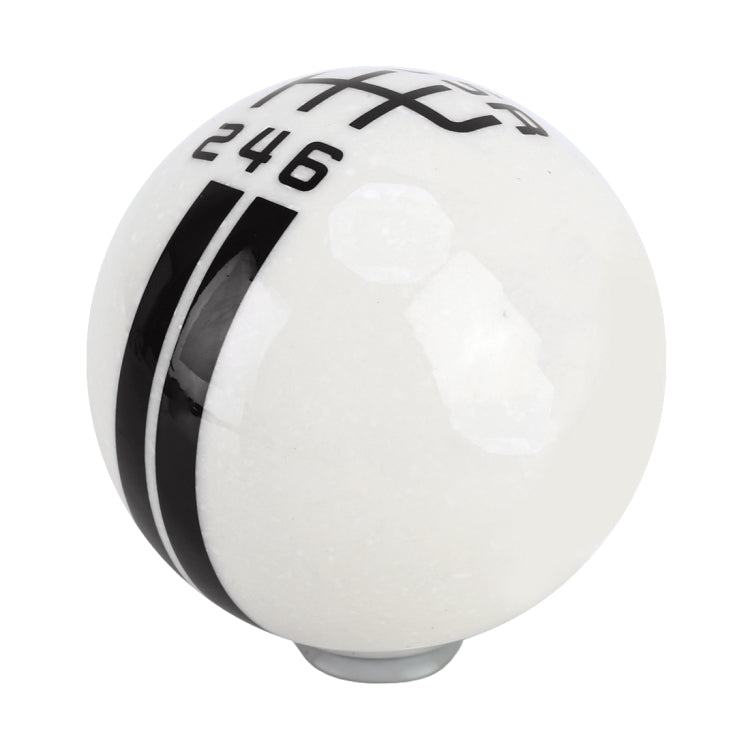 White ball-style gear shift knob with black 246 markings and cross stripes