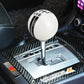 White ball gear shift knob with black 246 markings and cross stripes