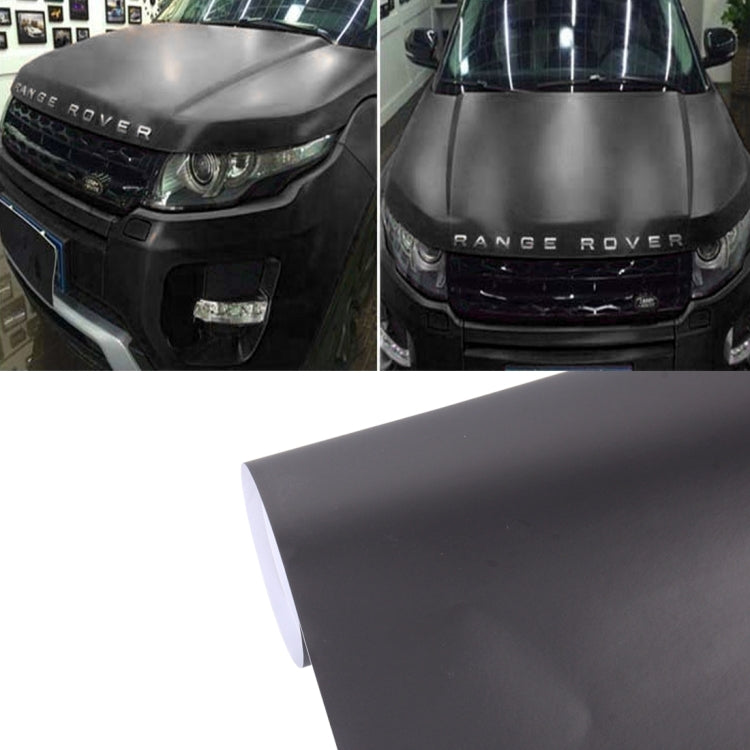 Dark gray metallic matte car wrap vinyl sheet, rolled edge on white background.