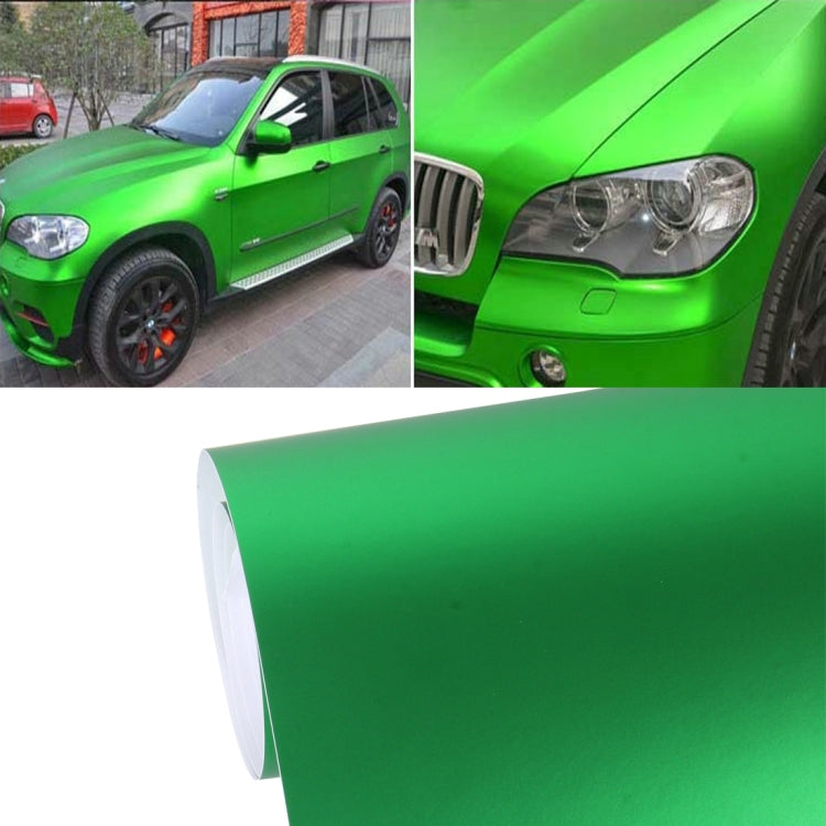 Metallic matte car decal wrap sheet in green, showing rolled edge and protective liner