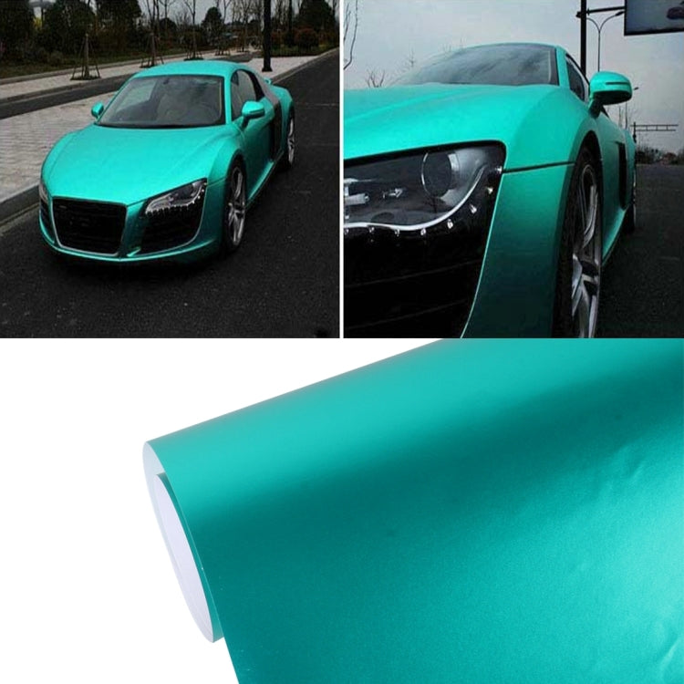 Teal metallic matte car wrap vinyl sheet, rolled edge on white background.