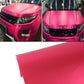 Metallic matte car decal wrap sheet in red, with glossy protective backing edge
