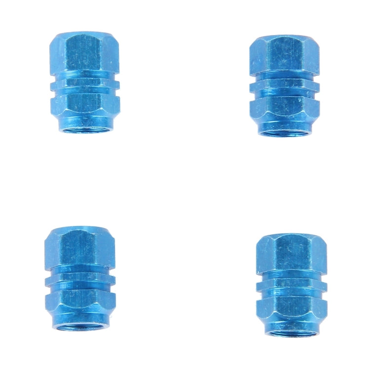 Blue metal plated hexagon tire valve stem caps, 4-pack, close-up set view