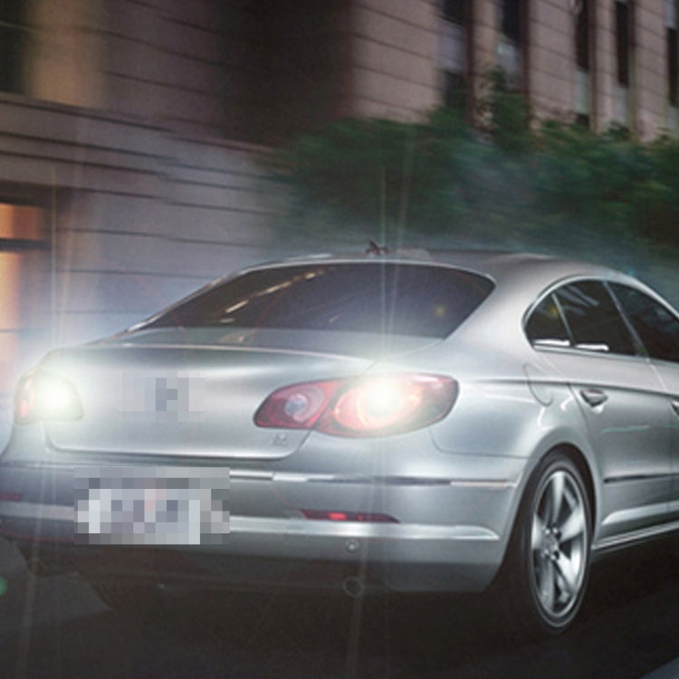 Car front with bright white LED headlight glow