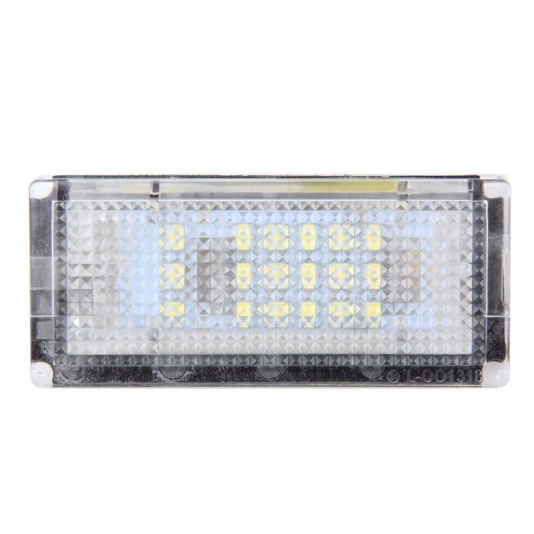 Rectangular clear LED license plate light with front LED grid lens
