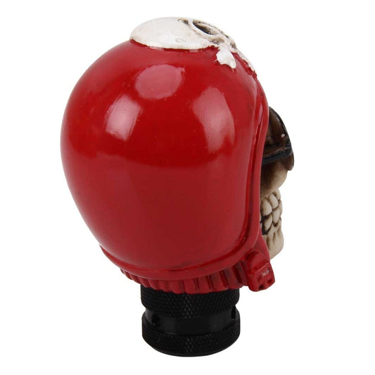 Skull-shaped gear shift knob cover, glossy red helmet over a black textured base