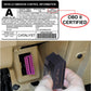 OBDII scanner plugged into a car’s diagnostic port, held by a hand
