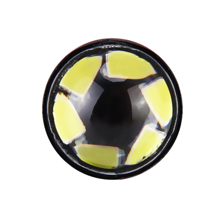 Close-up of circular SMD LED lens on a black P13W fog light bulb
