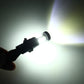 Bright white LED fog light bulb illuminated at the clear front lens