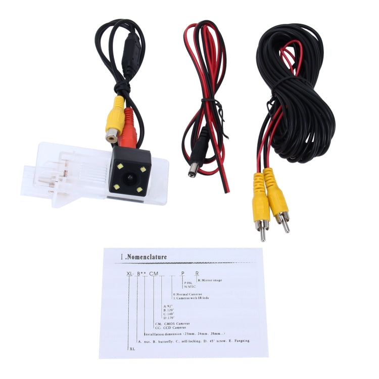 Car rear view backup camera kit with video/power cables and instruction sheet