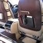Car seatback organizer storage pouch on rear seat with phone and key accessories