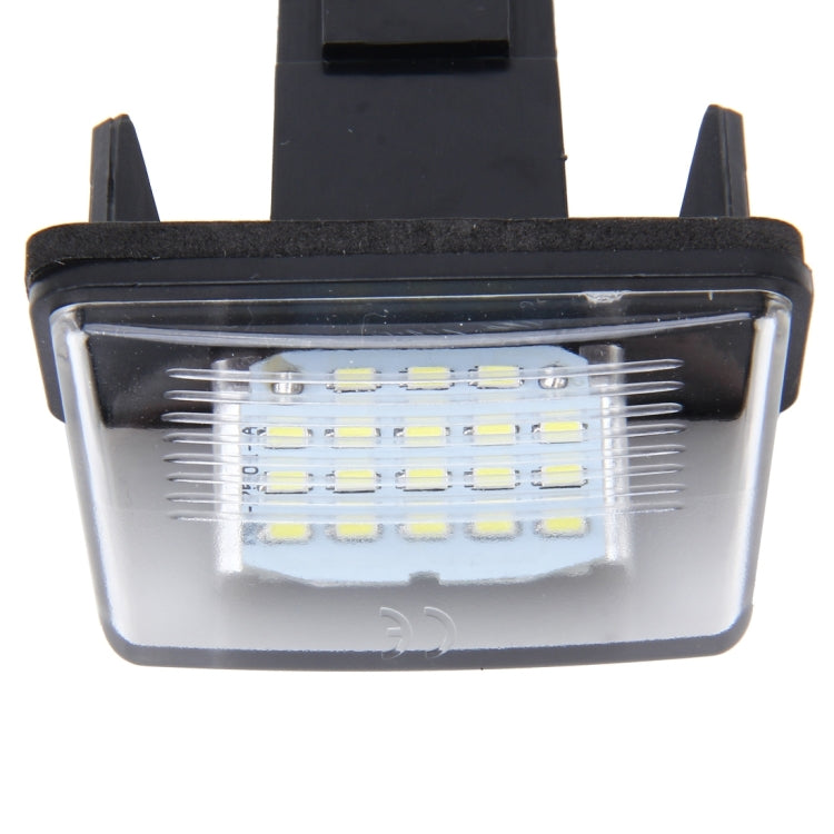 LED license plate light with black frame and clear lens, visible SMD LED chip array