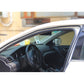 Car door with installed black rubber weather seal strip along the window frame