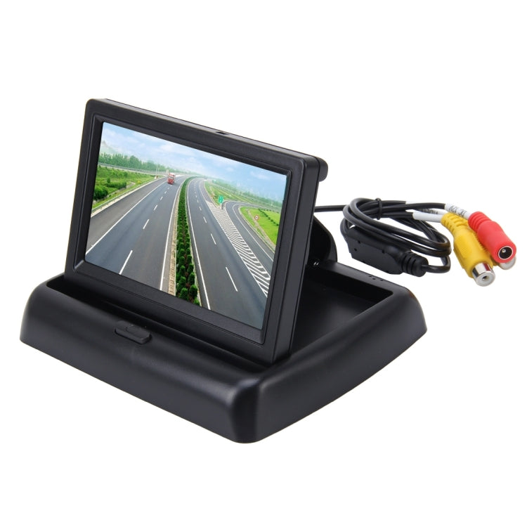 Foldable 4.3-inch car monitor with screen showing road view and RCA cable set, black