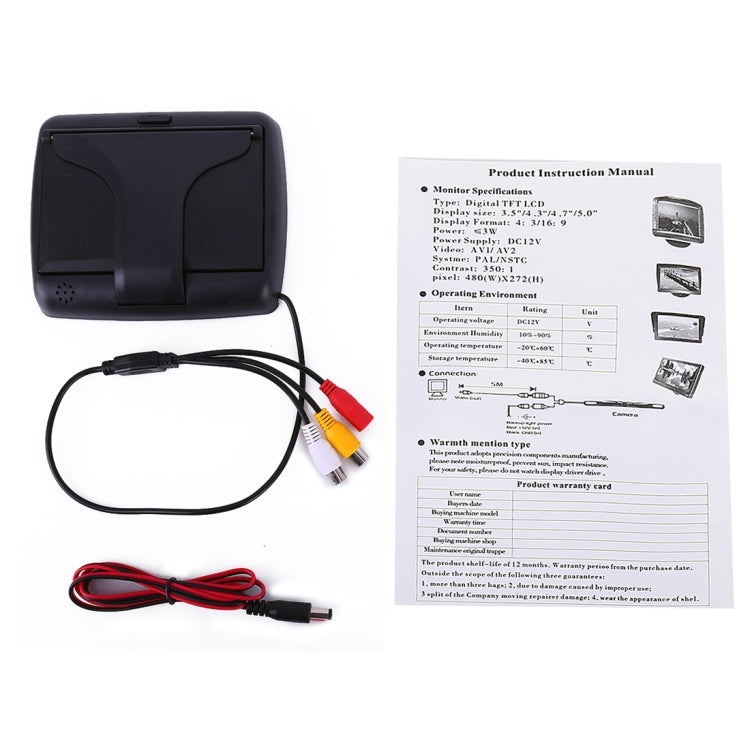 Foldable car monitor back view with instruction manual and connected AV power cables
