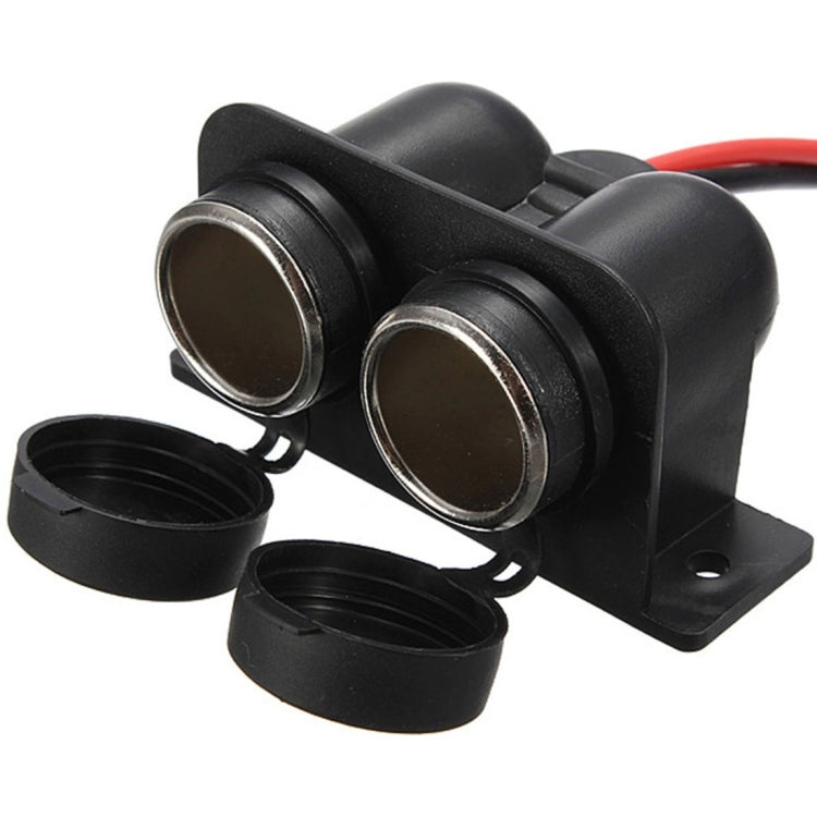Dual-port car cigar socket adaptor with two black ports and protective caps, mounting base