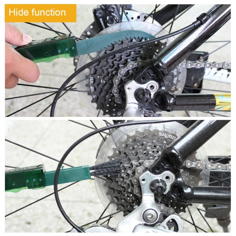 Green bicycle chain cleaning brush contacting rear cassette sprocket