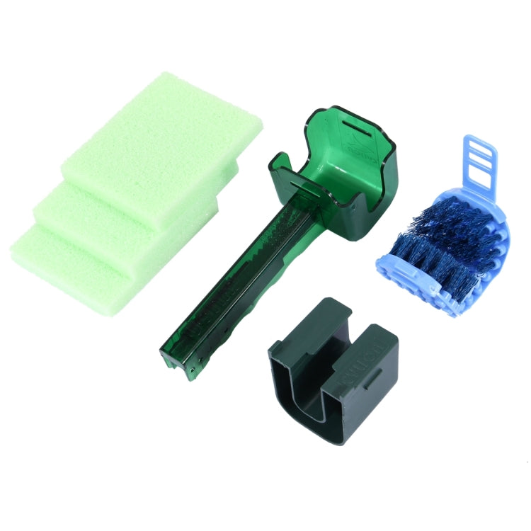 Bicycle chain cleaner kit with green frame, sponge pads, blue bristle brush, blades
