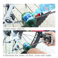 Squeezing chain cleaner onto bicycle chain with green holder and blue bristle brush