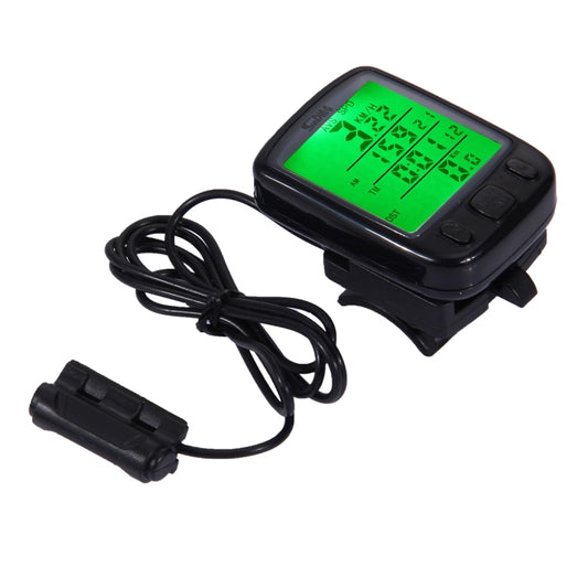 Black wired bicycle computer with green LCD screen and attached cable