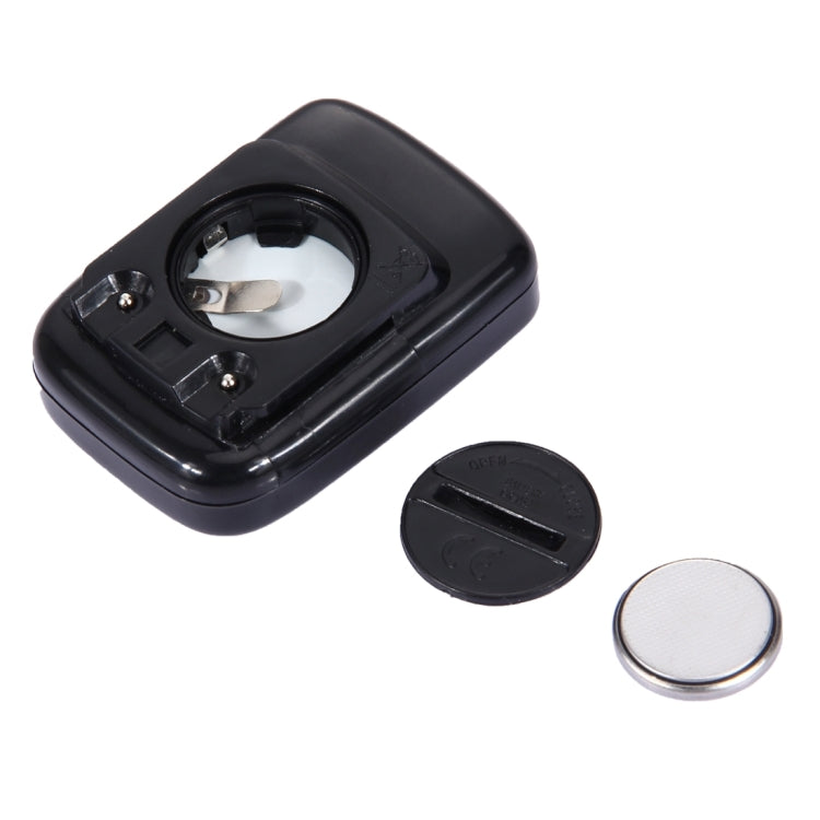 Black bike computer mount with battery compartment and round coin cell