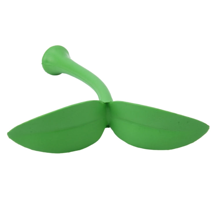 Green rubber decorative grass topper with wide two leaves and short stem base