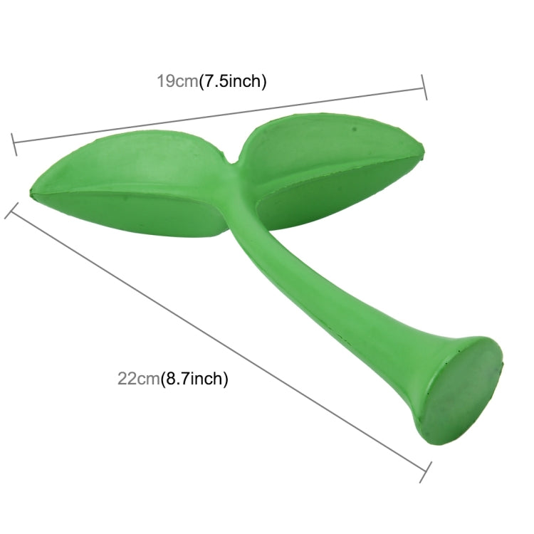 Green rubber decorative grass topper, two broad leaves, curved stem, foot base