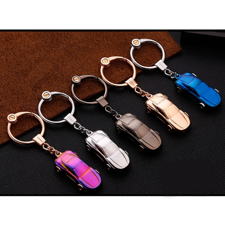 Set of metal car shape keychain holders with different colored miniature car charms and rings.