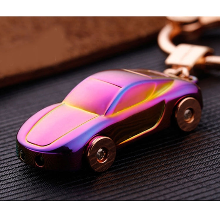 Metal car shape keychain holder with rainbow iridescent miniature car charm and metal ring.
