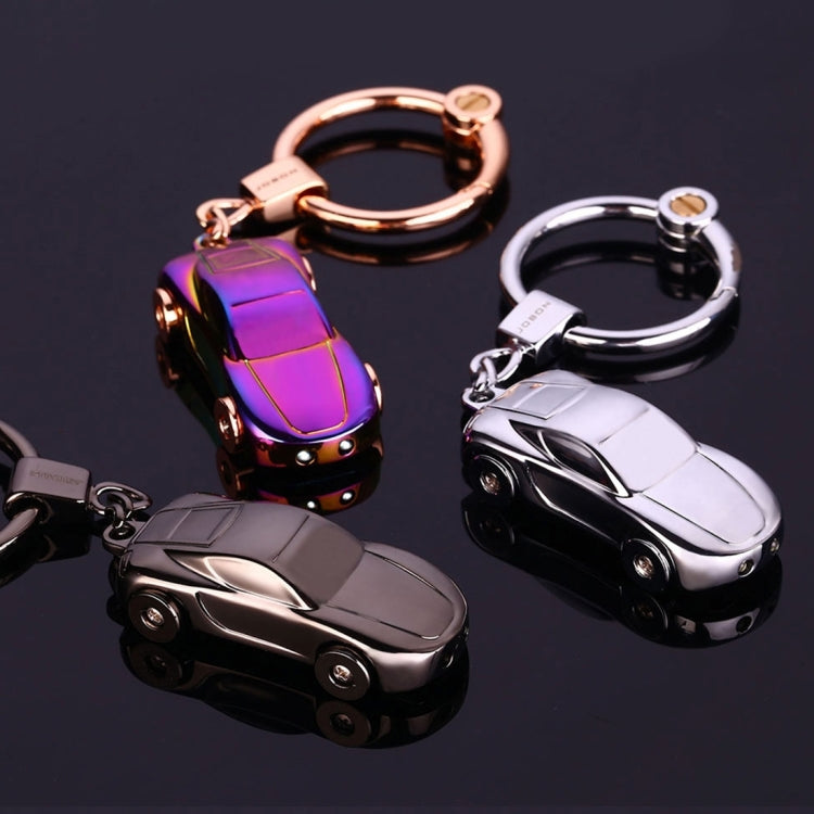 Metal car shape keychain holders, including silver and purple iridescent mini car charms with rings.