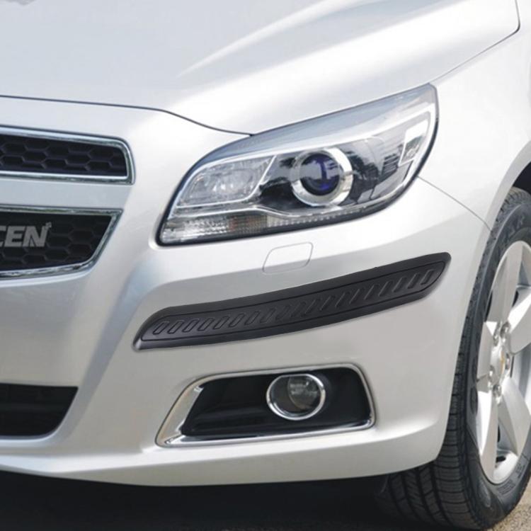 Black rubber bumper guard strip adhered on a car front bumper edge