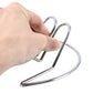Chrome metal amplifier display holder gripped by hand, two vertical supports and base