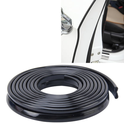 Black rubber door seal strip, coiled with snap-on edge, 5.6m length