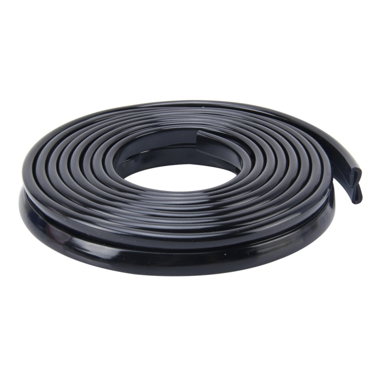 Black rubber weather strip seal, coiled roll with curved profile and end clip