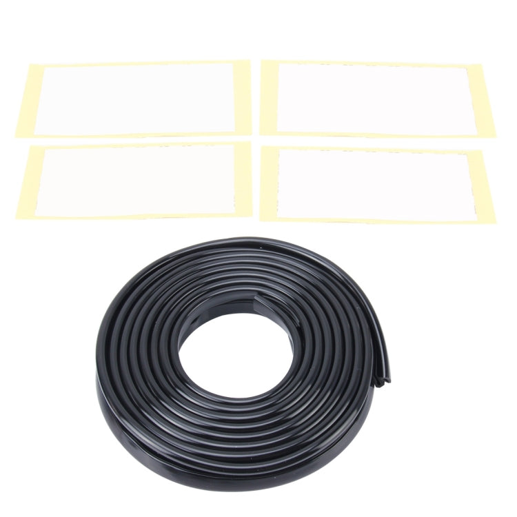 Black coiled rubber door seal strip roll with snap-on clip, shown with packaging