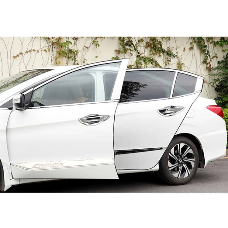 Black rubber door seal strip running along car door opening, exterior fitted