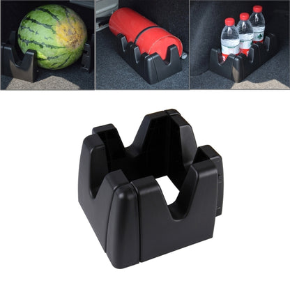 Car storage stabilizer holder set with black plastic clamps, shown with watermelon