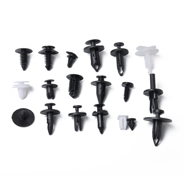 Assorted black and white plastic car panel retainer clips and push rivets