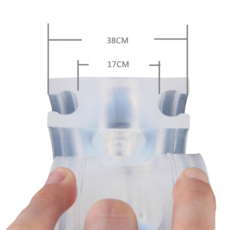 Clear shock absorber spring bumper buffer held between hands