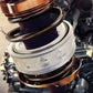 Translucent shock spring bumper buffers seated around dark coil springs