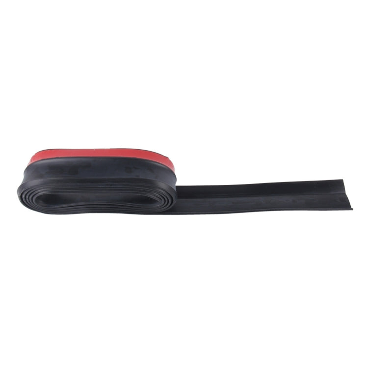 Bumper lip protector strip, black with red top edge, shown stretched out